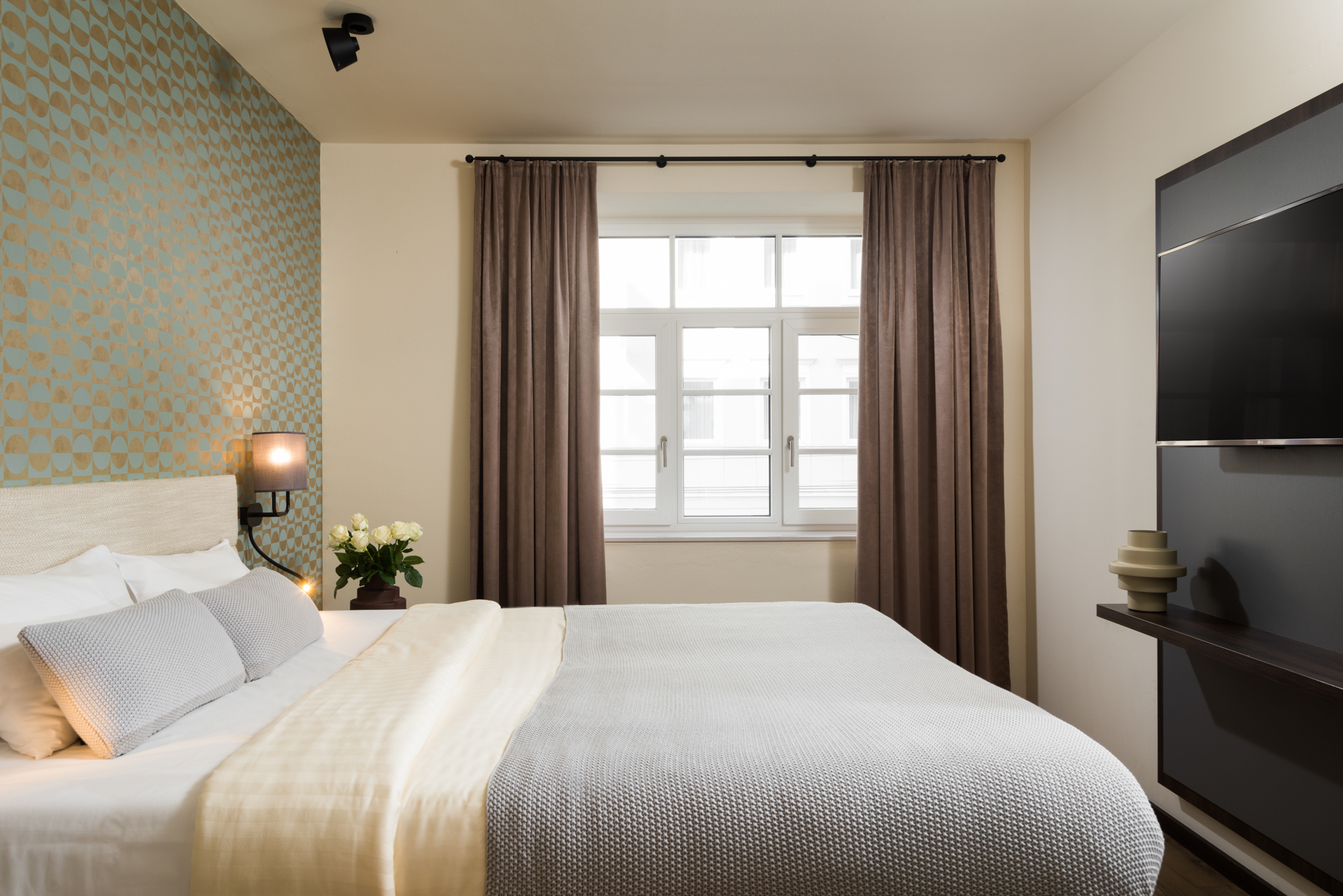 Soft and inviting bed at master Mirabell, perfect for a restful sleep.