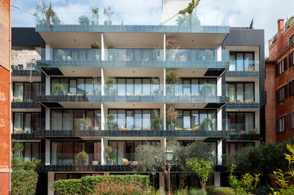 Exterior view of master Trevi Rome Aparthotel showcasing classic architecture and private balconies.